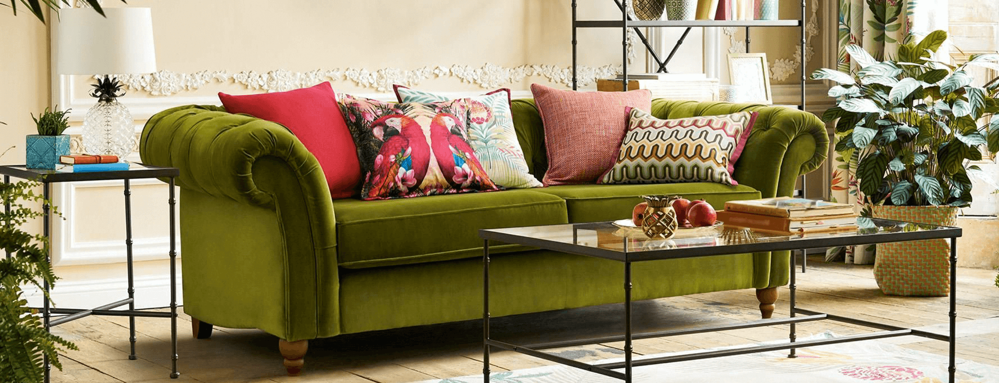 Bohemian interior design with many bright pillows